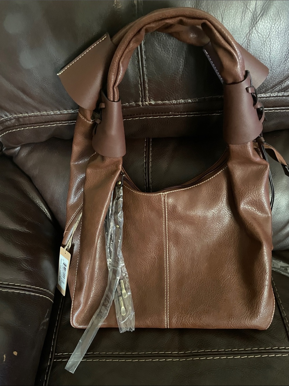 Classic Brown Leather Shoulder Bag with Twisted Handles